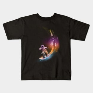 Astronaut surfer surfing in space with a surfboard. Kids T-Shirt